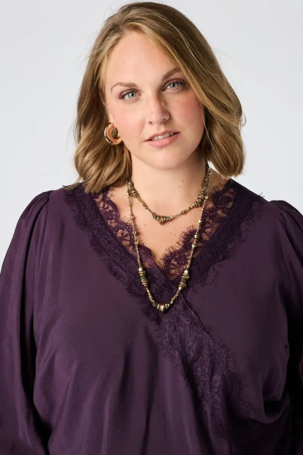 Blouse avec détails en dentelle