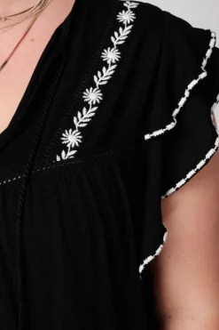 Blouse à manches courtes à volants