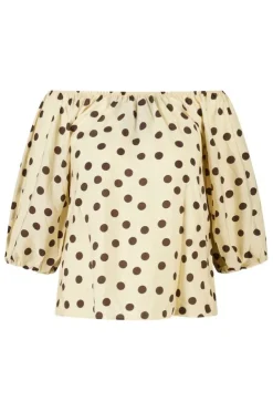 Blouse à pois épaules dénudées