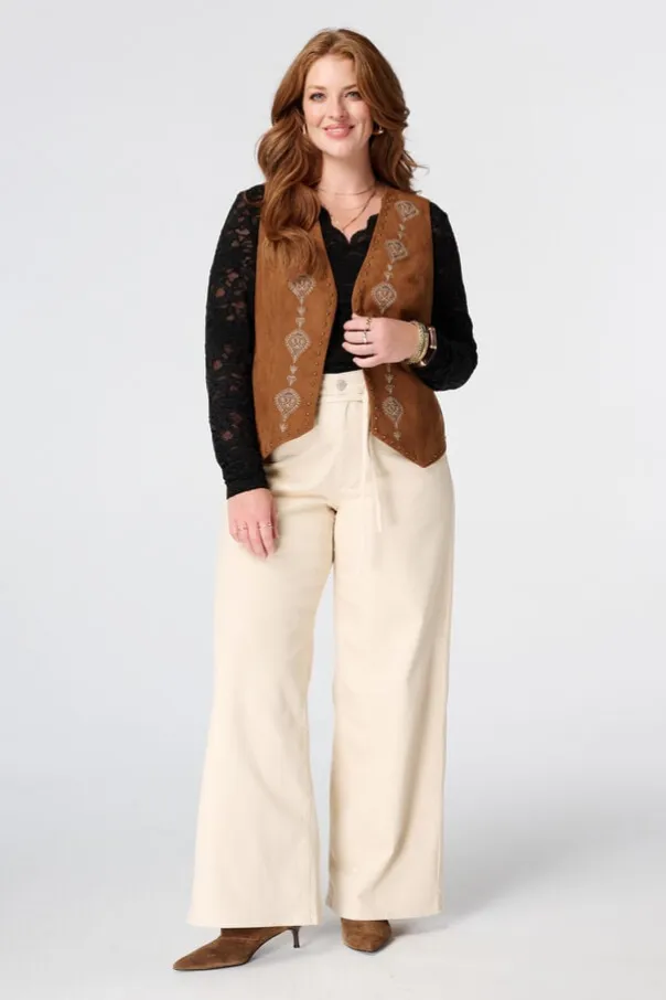 Gilet avec broderies et clous