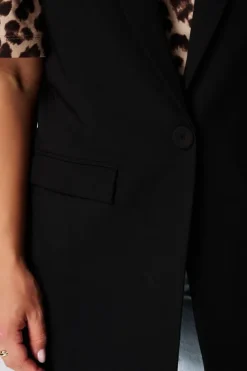 Gilet long à fermeture boutonnée