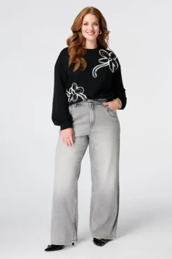 Jean à jambes évasées avec ceinture