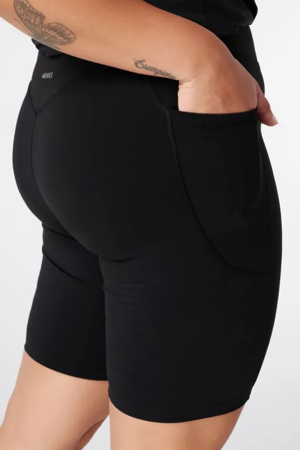 Legging de sport courte avec poches latérales