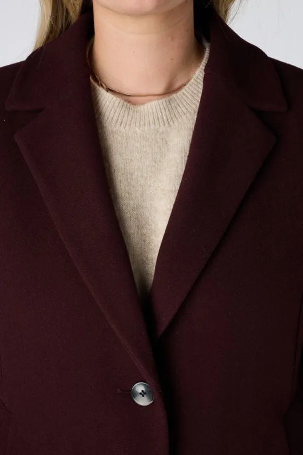 Manteau court à boutons