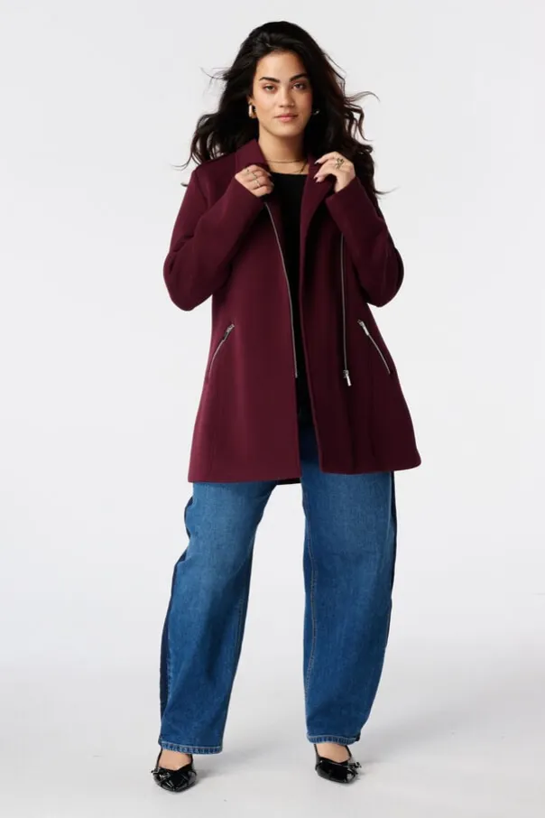 Manteau à fermeture éclair