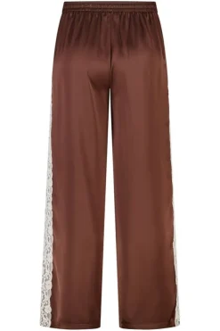 Pantalon avec détails en dentelle sur les côtés