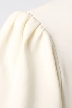 Sweat à manches bouffantes courtes