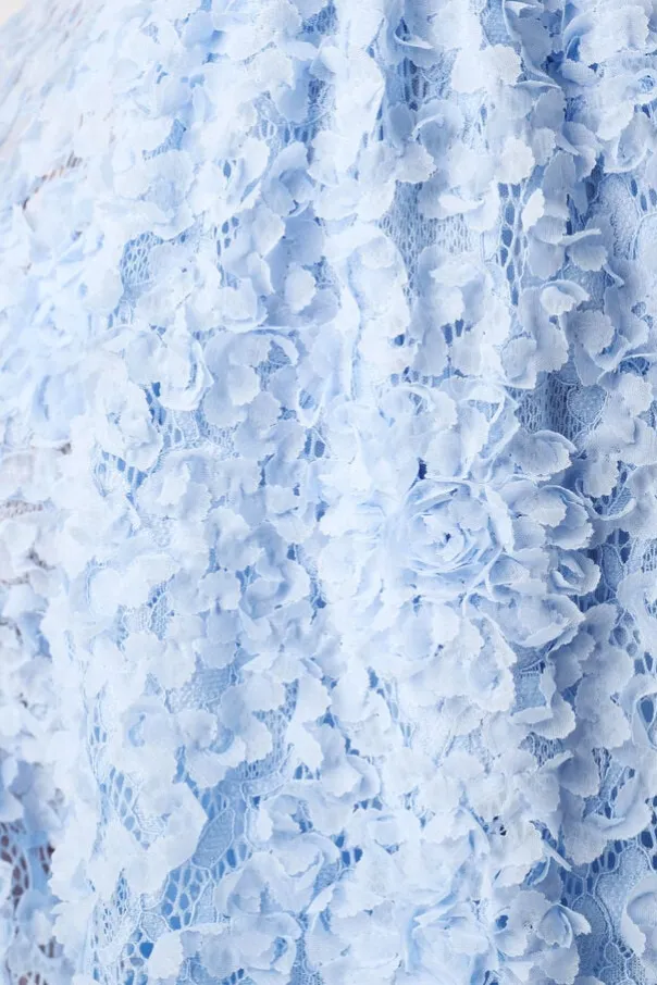 Top avec fleurs 3D