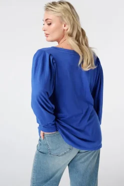 Top à manches bouffantes